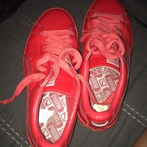 Red puma shoes